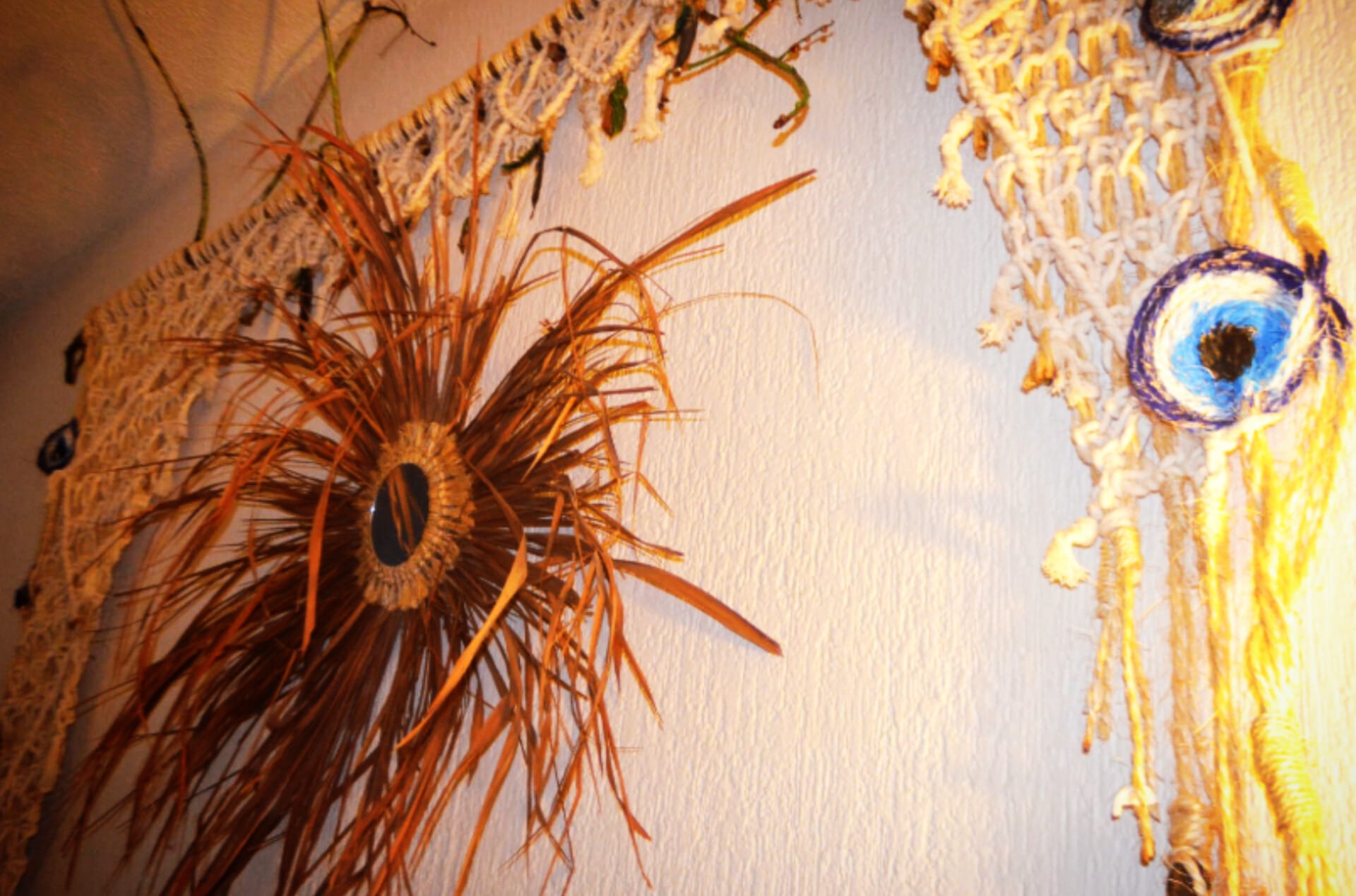 healing macreme wall hanging all elements present, therapeutic art at earthing clubhouse PCD MX. feathers, crystals, charcoal. infrared, and more.